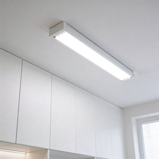 Slim white LED ceiling light fixture mounted on the ceiling in a modern Irish interior