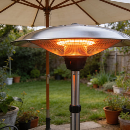 Silver directional outdoor parasol heater mounted on umbrella pole in garden