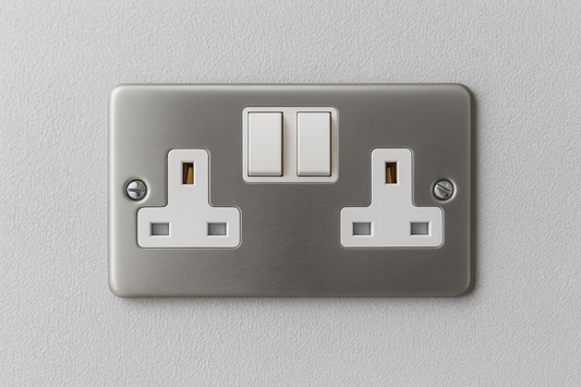 Claddagh Range Y410M 13A 2-Gang Double Pole Metal Clad Switched Socket mounted on wall – front view