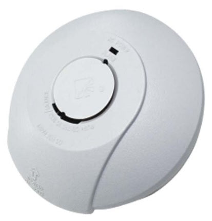 Close-up view of the Evolec mains smoke detector with battery backup, showing its compact white design and test/hush button.