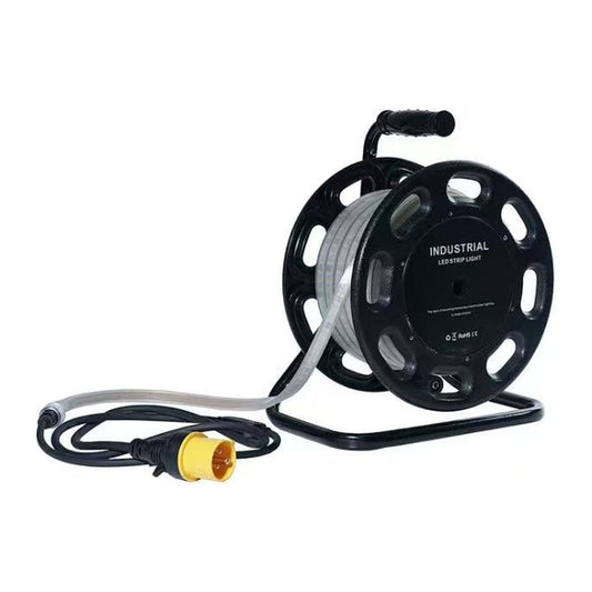 Greenlamp 50 metre 110V LED site lighting reel with the IP65 strip wound on a black steel carry reel and a yellow 16A 110V plug fitted