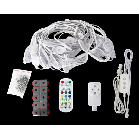Contents of the Greenlamp 15m smart RGB permanent outdoor light kit: the white light string with LED pods, inline controller, plug in power supply, remote control, mounting clips and a bag of screws