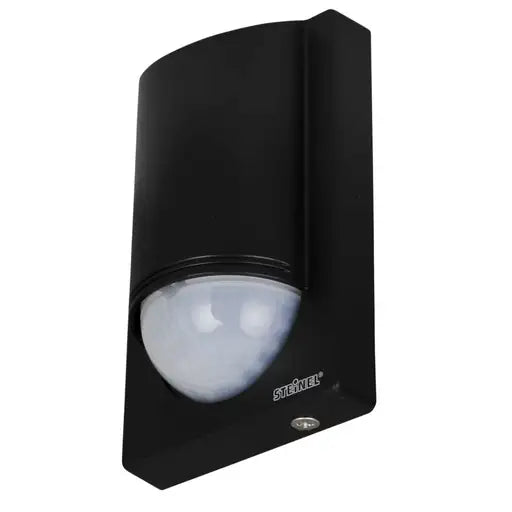 Angled view of the Steinel IS 2180 ECO black wall PIR motion detector with dome lens, up to 12 m range, IP54.