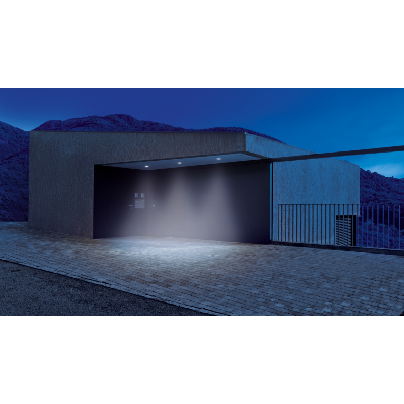 Steinel IS 2360 DE ECO recessed PIR activating ceiling lights at night—360° motion detection for entrances and canopies.